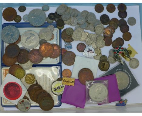 Coins and badges including an 1887 shilling, forty-four sixpences, seventeen threepences, decimal coin folder, commemorative 