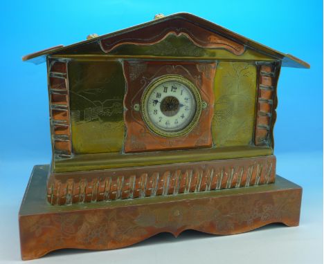 A brass and copper trench art clock, marked Lens, France, 1917