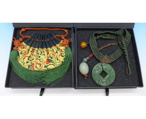 A Pivoine Taiwan designer jade and crochet necklet with amber clasp, a jade and crochet pendant and a reproduction ancient Ta