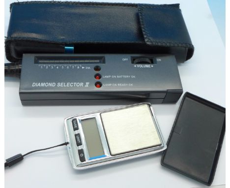 A diamond tester and a pair of digital scales