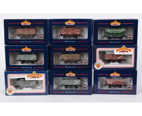 Twenty Bachmann 00-gauge wagons, various, boxed.