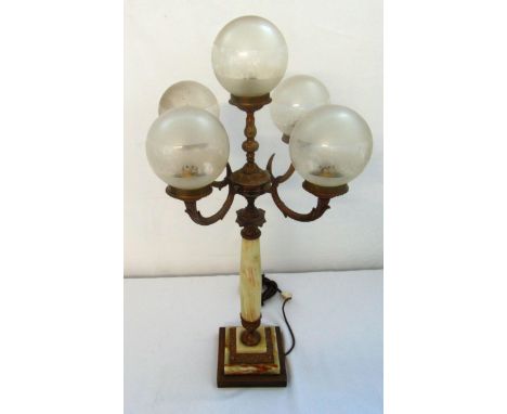 An early 20th century five light marble and gilt metal table lamp stand on cylindrical stem and stepped square base,(3 bulbou