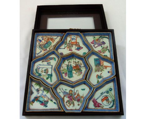 A cased 19th century oriental ceramic hors d’oeuvres dish decorated with figures in a landscape