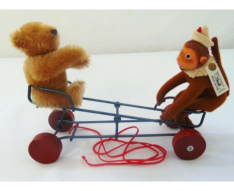 Steiff teeter-totter pull toy 400872, mohair woven fur blond bear and brown monkey on a metal car with wooden wheels, limited