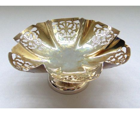A hallmarked silver bonbon dish scroll pierced on raised circular base Sheffield 1961, approx total weight 124g