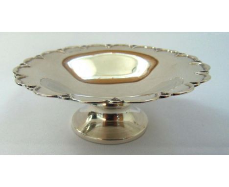 A hallmarked silver shaped circular bonbon dish on raised circular base, Sheffield 1945, approx total weight 86g