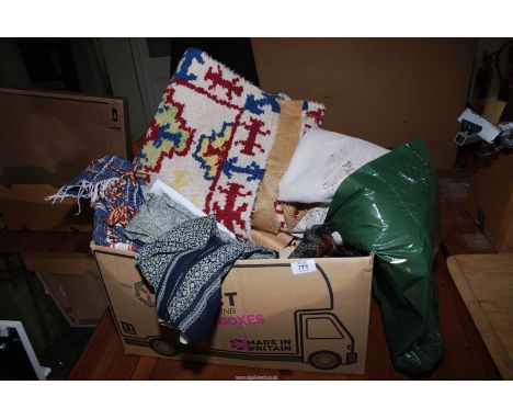 A homemade rug, fabric, curtains etc.