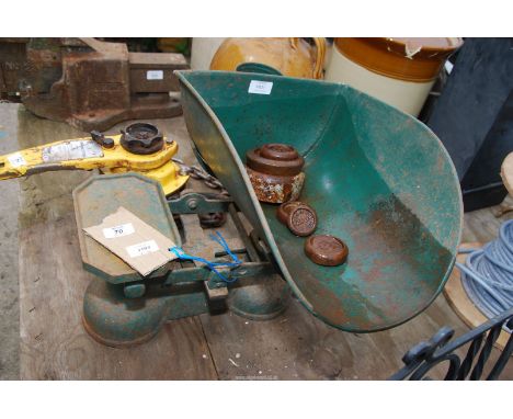A grocers scales with weights