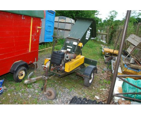 A "Waste Whacker Junior"  in good working order with Kohler engine, self starter.