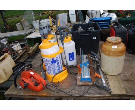 A Mitre saw, three Hozelock garden sprayers, small Chainsaw (as found).