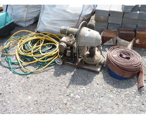 A "Simplite MK4" water pump with lay flat hose and "Villiers" engine,engine turns, plus a quantity of garden hose.