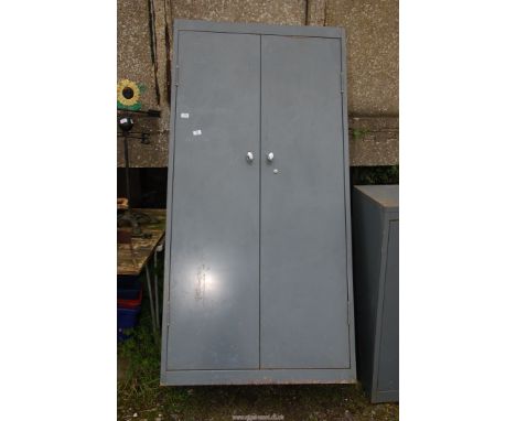 A metal cabinet, one shelf, 3' x 6' x 18" deep.