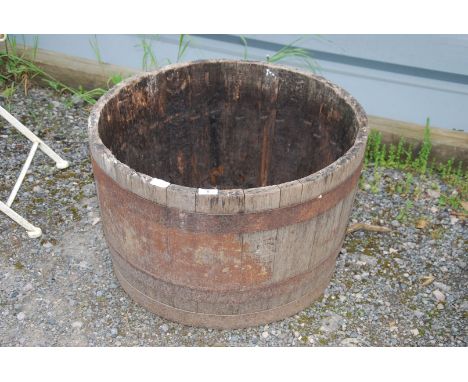 A Half barrel planter, 2' diameter x 16" high.