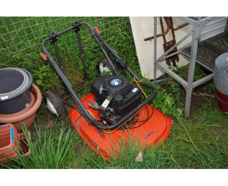 A Husqvarna hover mower with Honda 4 stroke engine (turns okay).