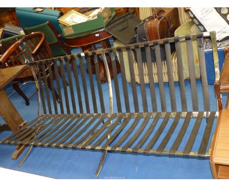 A chrome based strapped sofa base, 6' wide x 29 1/2" high.