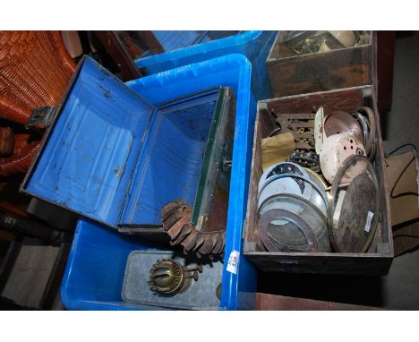 A green house heater, a small metal trunk, a cartridge belt, plus clock fronts etc.