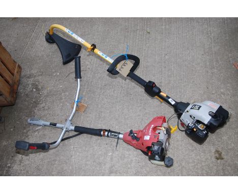 A "Ryobi" Strimmer with bump feed, (cord broken) plus a "Einhell" engine for spare or repair.