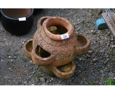 A terracotta strawberry planter.