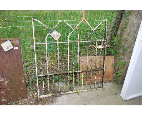 A metal garden gate, 34" wide x 37" high.