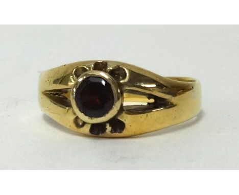 An 18ct garnet set dress ring, approx 7gms, ring size V1/2