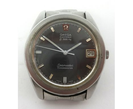 Omega Seamaster Electronic, a gents chronometer wristwatch with date, with box and papers with guarantee dated 1957.