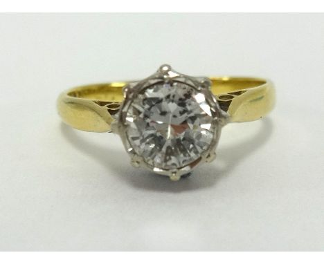 An 18ct solitaire diamond set ring, the round diamond approx 0.75cts.