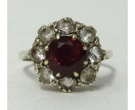 A 9ct ruby style cluster ring, ring size N