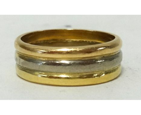 A three colour gold band ring, ring size L1/2, approx 7gms