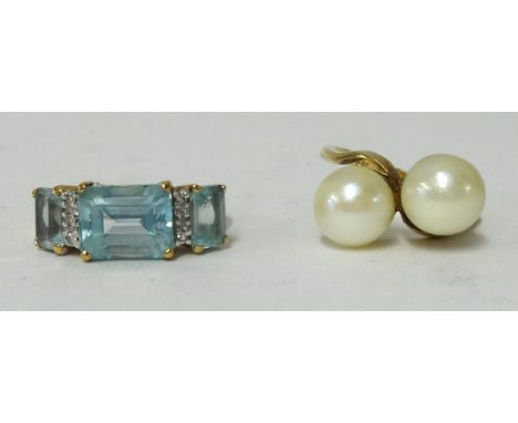 A 9ct dress ring set with blue stone and a 9ct twin pearl dress ring (2).