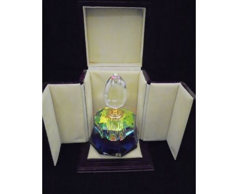 A collection of modern glass scent bottles, trinket boxes and other ornamental wares including glass Christmas tree ornaments
