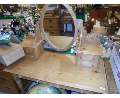 A modern pine dressing table with mirrored super structure raised on turned and ringed legs, together with a modern oak chest