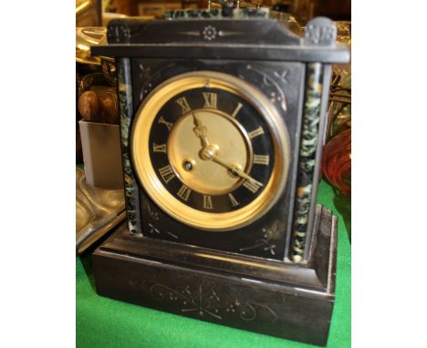 A late 19th Century French black slate and marble cased mantle clock, the 8-day movement by J Marti of Paris with circular ch