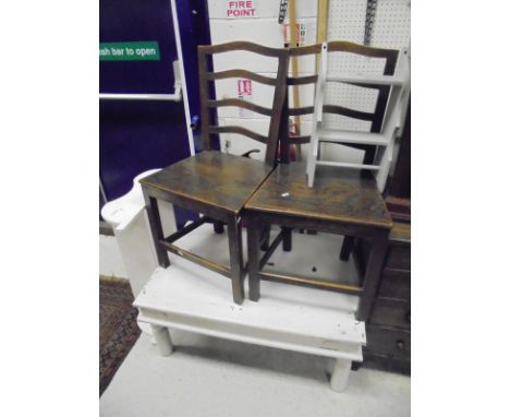 A white painted Indian coffee table of rectangular form on turned legs, together with a painted two shelf wall unit and a ris