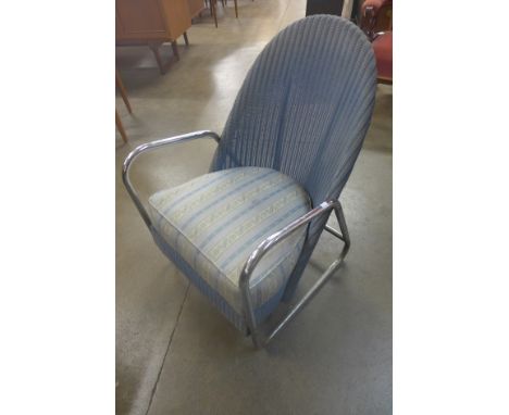 A 1930's Lloyd Loom style chrome and blue wicker armchair