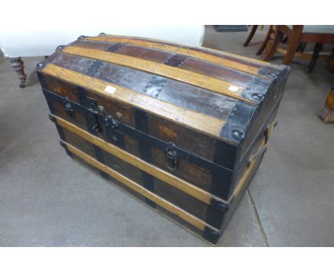 An early 20th Century dome topped steamer trunk