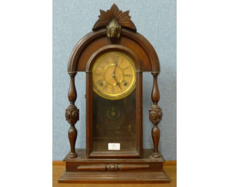 A 19th Century American beech shelf clock