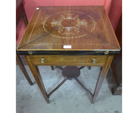 An Edward VII rosewood and marquetry inlaid envelope card table