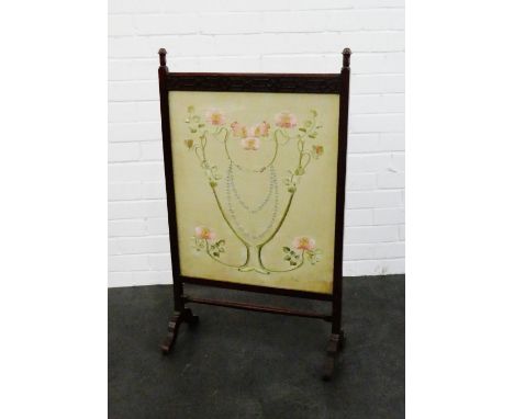 Early 20th century mahogany framed  fire screen with needlework insert, 96 x 56cm 