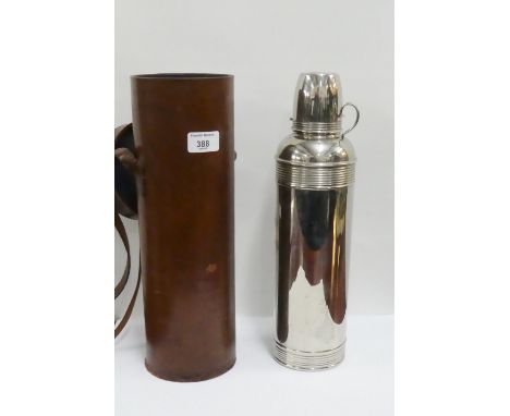 Vintage thermos flask in leather fitted case