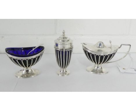 Edwardian London silver and blue glass three piece Adam style condiment set comprising salt and pepper with makers marks for 