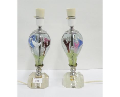 Pair of clear glass table lamp bases with coloured floral patterned inclusions, 27cm high excluding fittings, (2) 