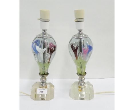 Pair of clear glass table lamp bases with coloured floral patterned inclusions, 27cm high excluding fittings, (2) 