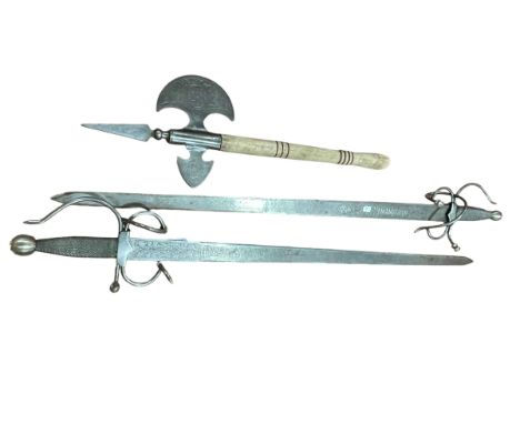 Two reproduction swords (Spanish?) and an axe.