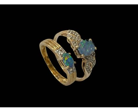 Two 9 carat gold, opal and gem stone rings.