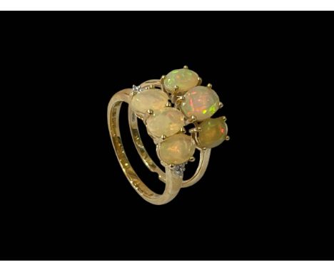 Two 10k/9carat gold opal rings.