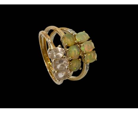 Three 10k/9carat gold opal and gem stone rings.