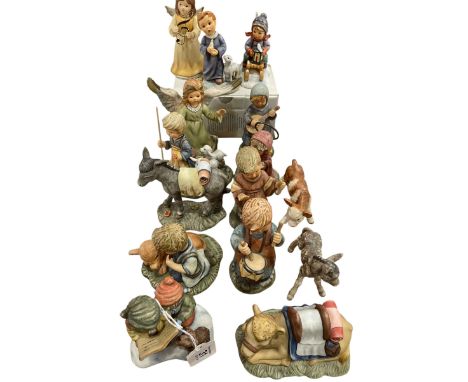Eleven Berta Hummel figures, Goebel figure 'Ride into Christmas', calf and donkey.