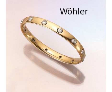 18 kt Gold Brillant-Armreif,   GG/WG 750/000,rundum 12 in WG gefasste Brillanten zus. ca. 0.72 ct Weiß/vs-si, ca. 6 x 5.5 cm,
