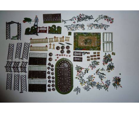 * Britains Miniature Gardening Pond (cracked), lily, nine flower beds, seven vases, three conifers, eight balustrade pieces, 