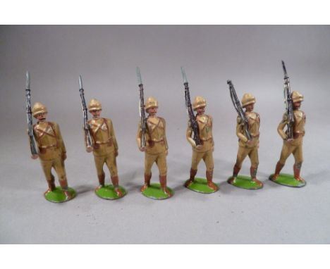 Britains set 110, Devonshire Regiment, Boer War Service Dress SECOND VERSION at the slope, helmet with pugaree, with paper la